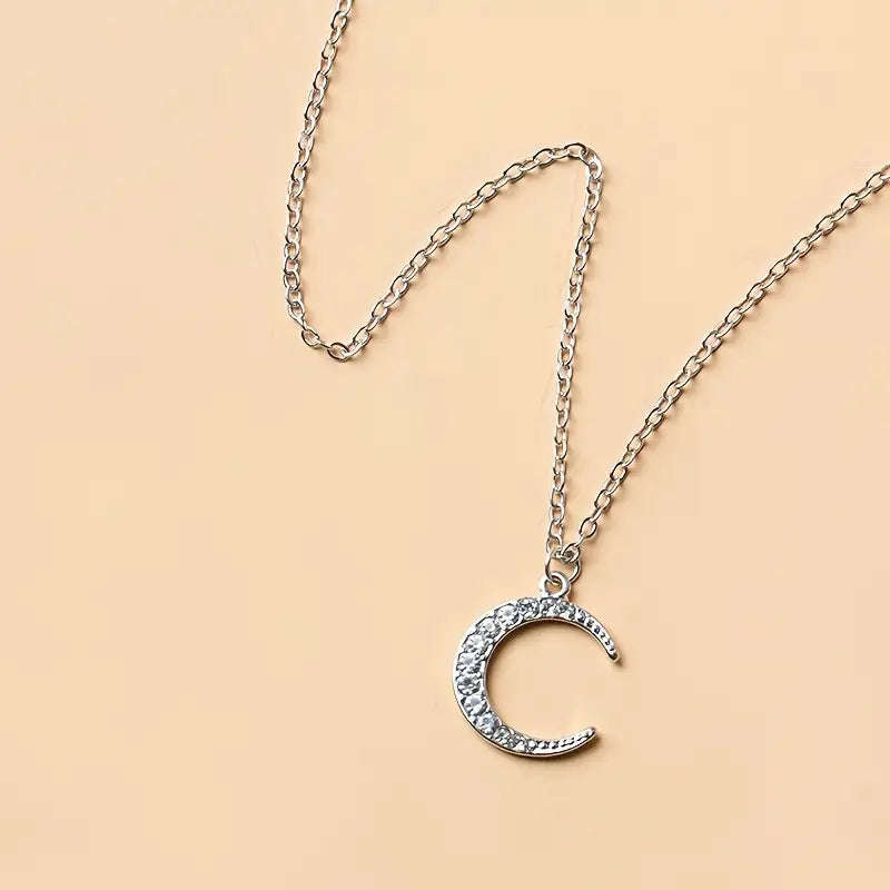 Colar com pendente em forma de lua