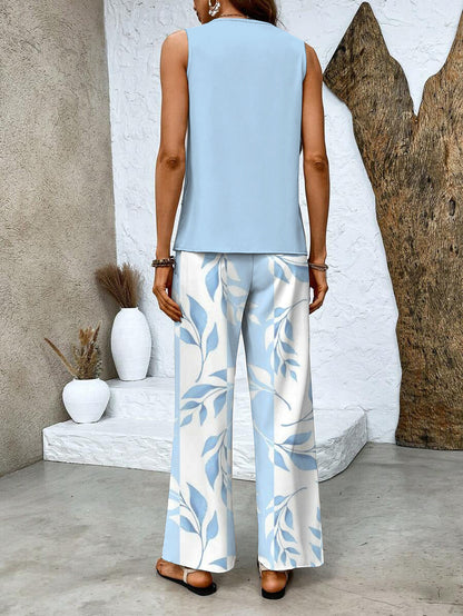 Alba | Conjunto de blusa e calça com estampa floral estilosa