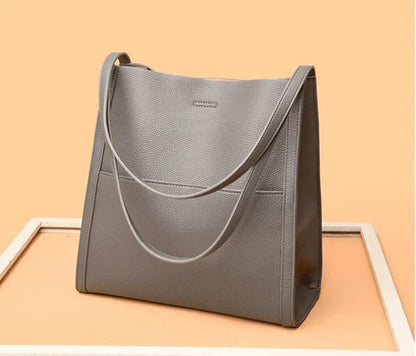 Elda - Bolsa tiracolo simples em cor lisa