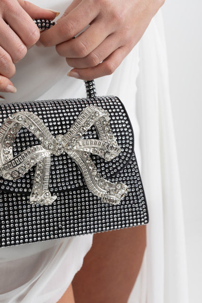 Clutch de Strass Brilhante com Laço Metálico Decorativo - Preto