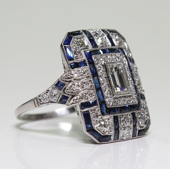 Anel vintage em prata brilhante e zircônia azul
